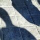 Photo of people shadows on paving stones